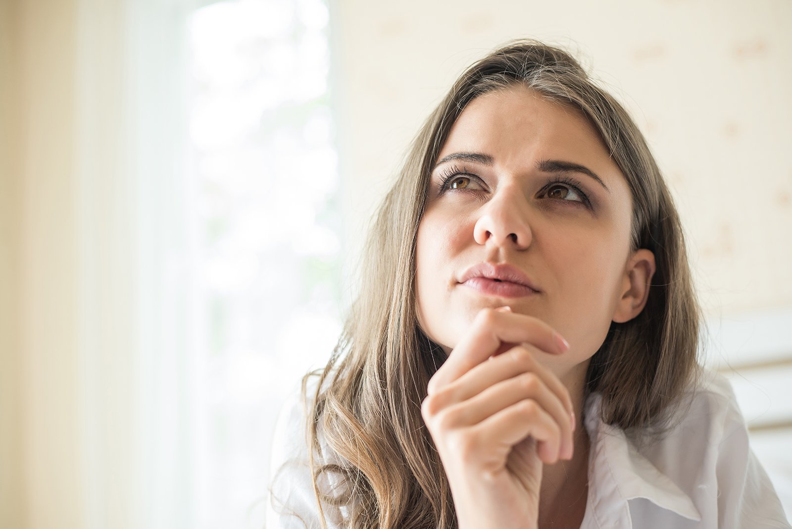 Woman thinking about PCOS