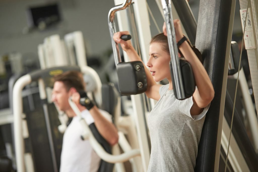 people exercising in gym