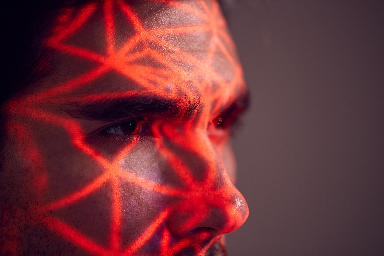 red light on woman's face