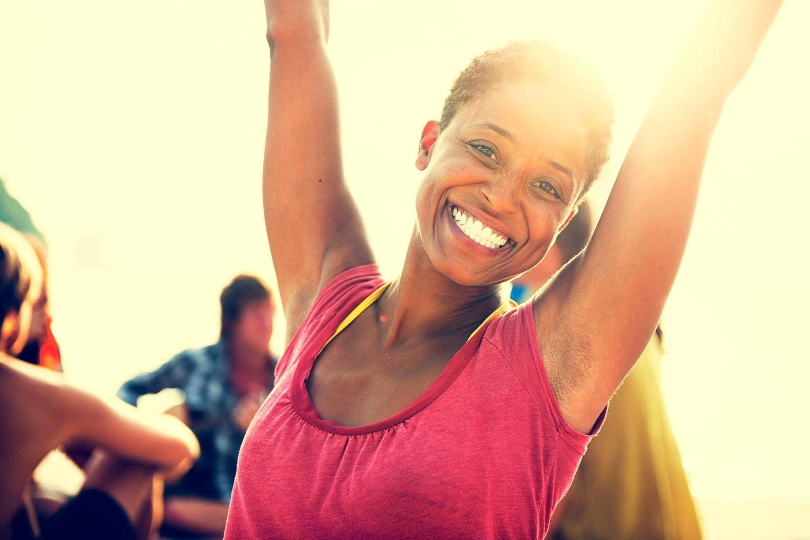 happy and healthy woman after completing hormone replacement therapy